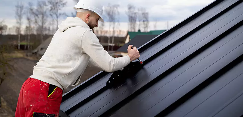 Tin Roof Ridge Cap Installation in Kirkland